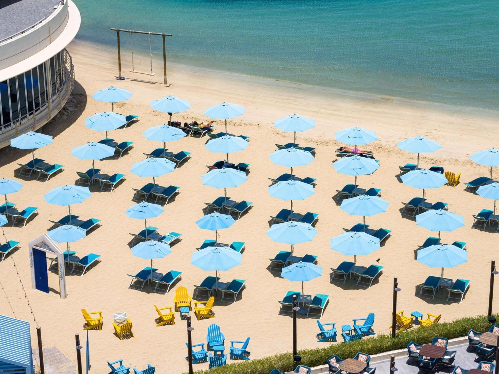 Отель Hilton Доха Экстерьер фото The beach at the Atlantis Paradise Island